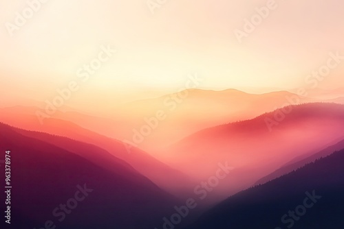 Stunning landscape showcasing misty mountains at sunset, with vibrant colors creating a tranquil and serene atmosphere.