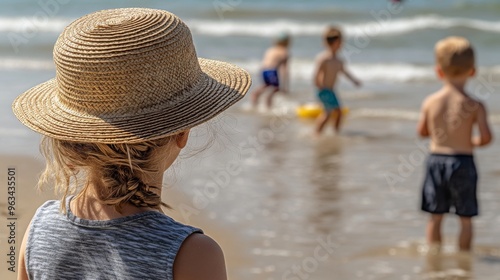 Enjoying a sunny beach vacation, this picture captures playful and happy moments with a backdrop of blue skies and crystalclear water evoking carefree happiness and togetherness