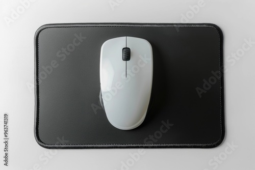 A computer mouse placed on a mouse pad, ready for use