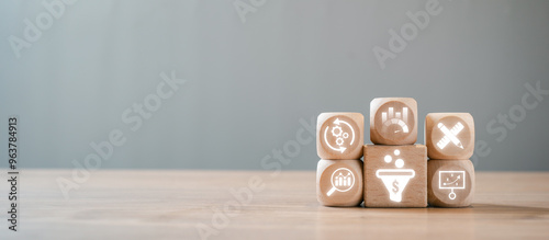 Wooden blocks with digital icons illustrating conversion rate optimization, data analysis, marketing strategies, and business growth concepts.