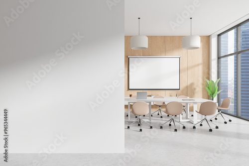 Modern office meeting room in bright open space. Features a blank wall, wooden accent wall, large windows, and minimalist furniture. Concept of workspace. 3D Rendering