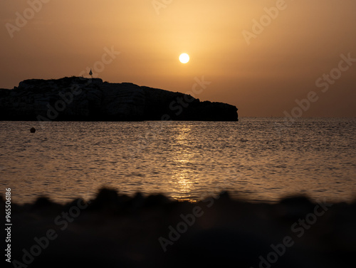 Beautiful sunrise over the Adriatic Sea and Campi island. Baia and Cala Campi, Vieste, Gargano National Park. Italy