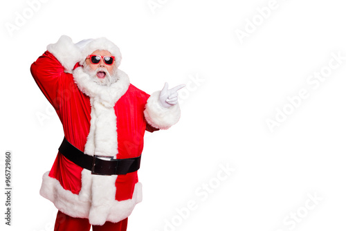 Portrait of his he nice attractive cheerful cheery glad stunned bearded Santa showing ad advert copy space present gift surprise isolated over bright vivid shine red background