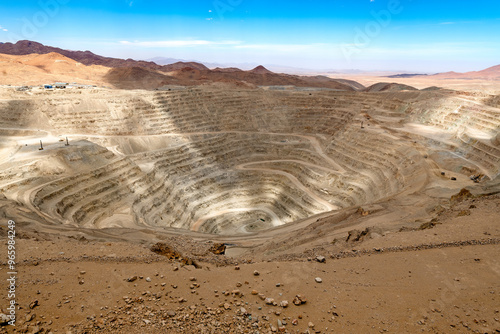 View from above of the pit of an open-pit copper mine in Chile