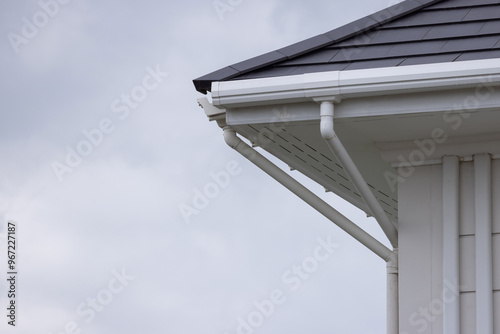 A roof with a gutter on the side