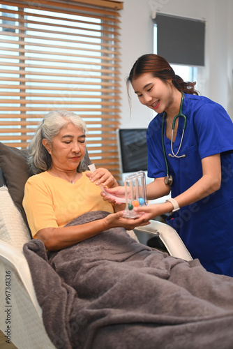 Physical therapist using Incentive Spirometer or Triflow to help patients to improve the functioning of their lungs