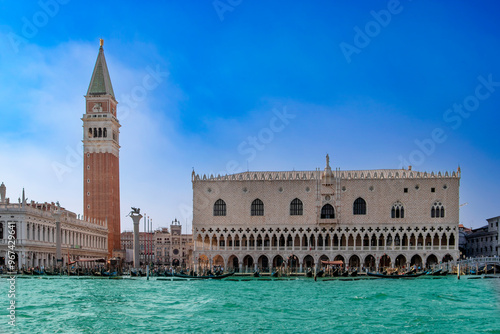 Beautiful view of Venice, Italy with Campanile tower of Saint Mark's Cathedral, Basilica on San Marco square and Doges' Palace. Italian buildings cityscape. Famous romantic city on water.