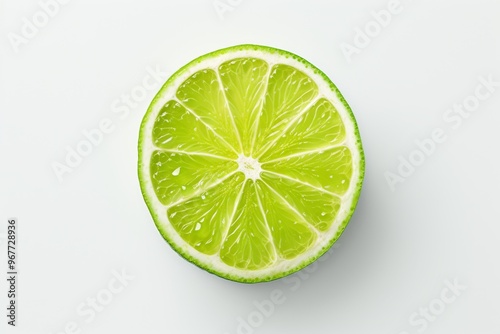 Fresh lime slice on a clean white background showcasing its vibrant color and texture