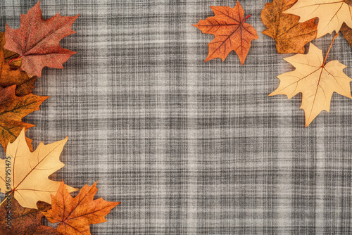 Autumn leaves on a table with room for text