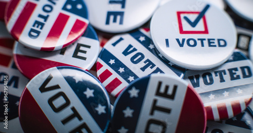 Close up of patriotic badges with American flag logo and inscription Vote. Election Day in the United States of America. Political race and presidential campaign. Democracy and patriotism concept.