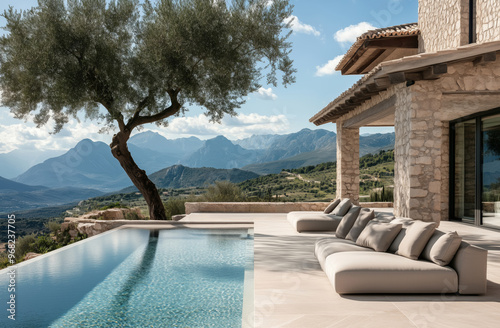 Outdoor pool area with modern furniture and views of the green mountains