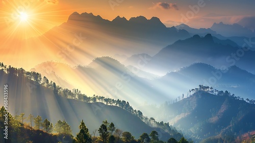 Majestic sunrise over misty mountains with sun rays illuminating the fog-covered valleys, casting long shadows on the forested hills.