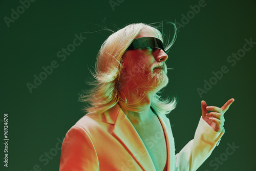 Futuristic man with long hair in sunglasses on a colorful gradient background, showcasing a blend of retro and modern styles Vibrant colors enhance the dynamic look