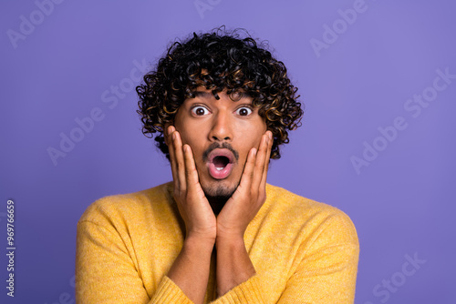 Photo of impressed shocked man wear trendy yellow clothes win winner wow isolated on violet color background