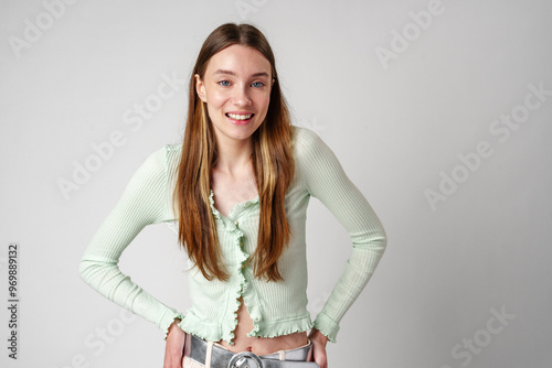 Young Woman With Long Brown Hair and Blue Eyes