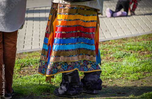 Close up of a ribbon skirt. Ribbon skirts are traditionally worn by indigenous women and represent a direct connection to Mother Earth. They are typically worn for special occasions.