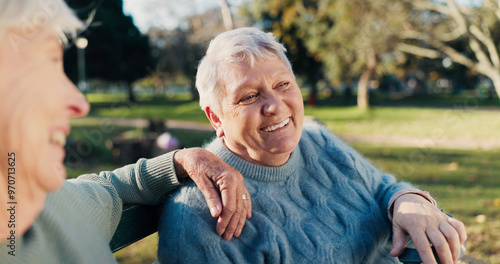 Friends, happy and senior women in park for bonding, conversation and relax together outdoors. Friendship, retirement and elderly people on bench talking, chat and laughing in nature for wellness