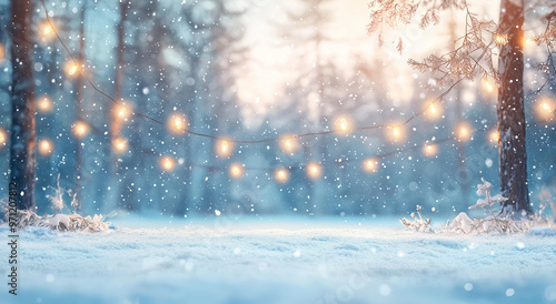 A blurred background of an empty snowy winter scene with hanging lights and snowflakes