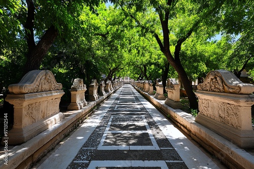 The Alyscamps necropolis, with rows of ancient sarcophagi lining a peaceful tree-lined path, capturing Arlesâ€™ Roman history