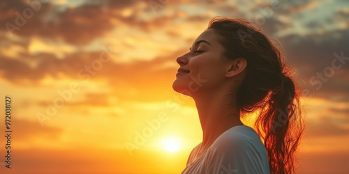 Woman Silhouetted at Sunset