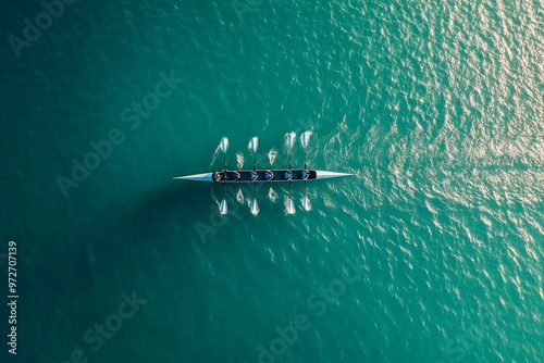 Aerial View of Rowing Team on a Turquoise Lake