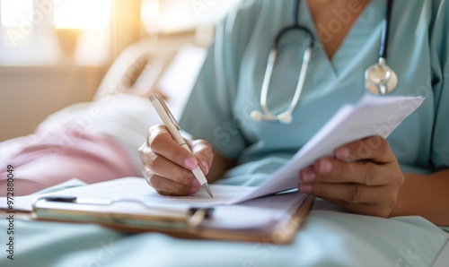 Nurse Taking Notes While Attending to a Patient in a Hospital Bed: Compassionate Care in Action