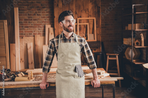 Photo of workman standing look profile side in workshop garage