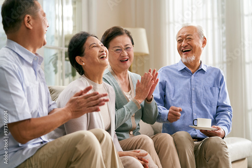 group of asian senior people gathering at home