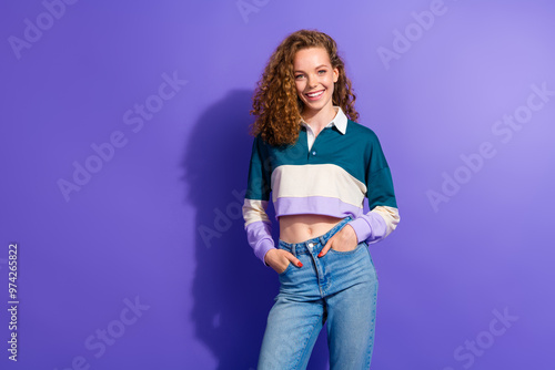 Photo of nice charming young girl posing empty space isolated on violet color background