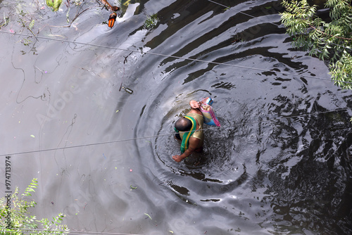 Man walking in the flood water