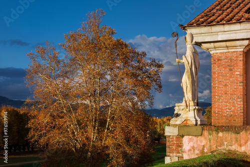 Autumn view of Lucca ancient walls public park at St Donato Gate