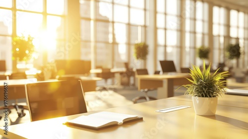 Elegant office interior with blurry beige desks in a sunlit luxurious setting.