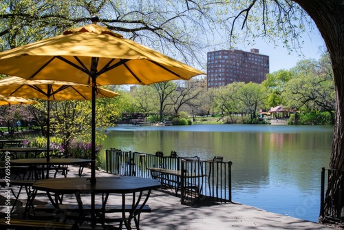 The park has a resting area with tables, chairs, and a parasol