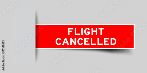 Red color square shape sticker label with word flight cancelled inserted in gray background