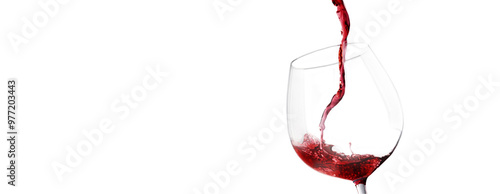 A close-up of red wine being poured into a glass, isolated on a white background. The splash and flow of the liquid capture a dynamic moment.