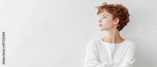 Self-embracing individual with gentle demeanor, solid white background, capturing essence of inner peace and self-respect