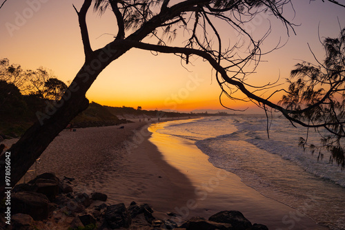 unset beach views across Main Beach in Byron Bay, New South Wales, Eastern Australia