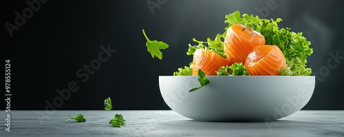 Fresh salmon fillet served on a bed of vibrant greens in a minimalist bowl, perfect for healthy eating and culinary aesthetics.