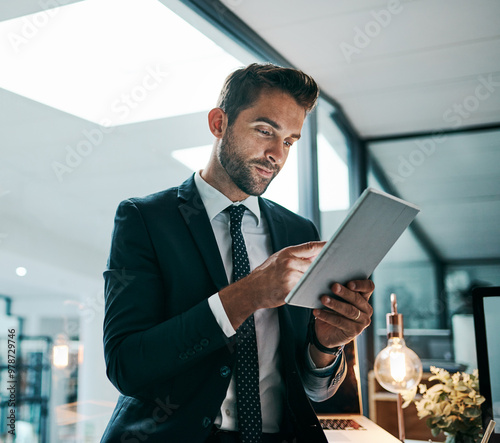 Office, thinking and businessman with tablet, deadline and reading of economic trends and online. Confident, stockbroker and contemplating for political events, market volatility and stock prices