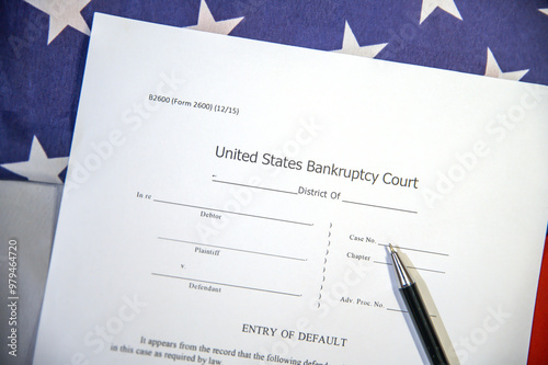 United States Bankruptcy Court form paper with American flag in the backdrop. Filing Bankruptcy in USA process concept backdrop