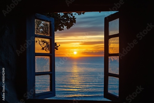 Calm sunset over the sea viewed through a window from a comfortable spot in Larino Galicia Spain