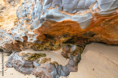 Full frame of sandstone cliff drawing, rock formation, natural sandstone on beach in california, lines and curves of stone used for background