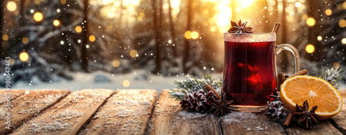 Steaming mug of mulled wine on a snowy forest table at sunset