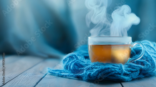 Steaming tea with wisps intertwining with blue yarn, symbolizing relaxation and creativity.