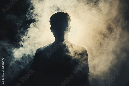 silhouette of a person and smoke around