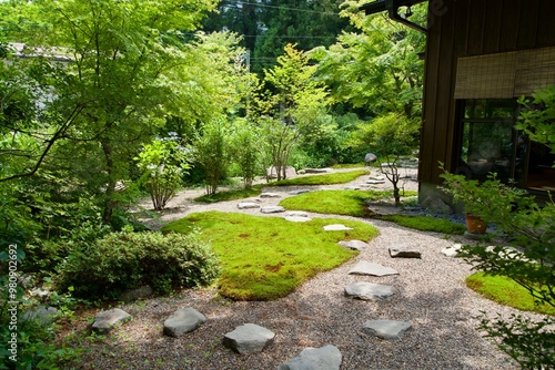 Japanese garden with beautifully maintained stones and moss