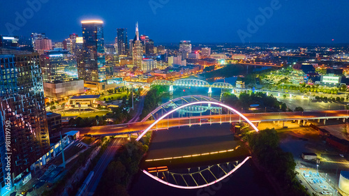 Aerial View Nashville Skyline with Bridges and River at Night