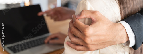 Disgusted asian young employee, pressure business woman uncomfortable, looking hand of boss or colleague when touching her shoulder, embrace. Sexual harassment inappropriate at office, workplace.