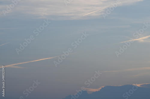 Blue sky with clouds and plane jet streams