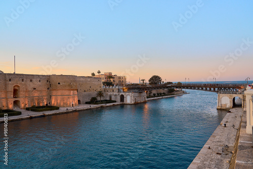 Aragonese castle of Taranto at sunset with orange colors in high definition